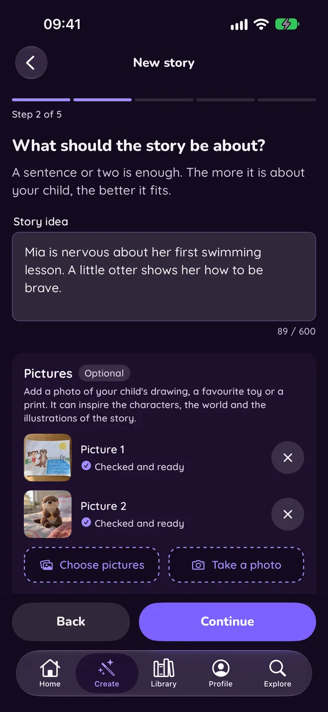 A new story's idea in the Booklly app, with a child's drawing and a photo of a toy added to inspire it.